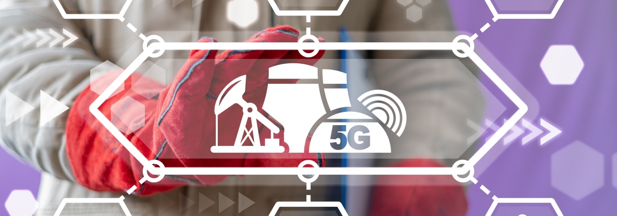 Technology employee points with red gloves to 5g hologram