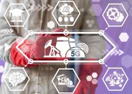 Technology employee points with red gloves to 5g hologram