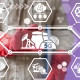 Technology employee points with red gloves to 5g hologram